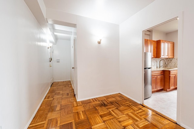 1705 Purdy St Unit 9C, Bronx, NY 10462 - hallway featuring a sink and baseboards