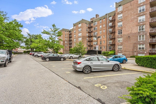212-30 23rd Ave Unit 6H, Bayside, NY 11360 - view of apartment building / complex featuring uncovered parking