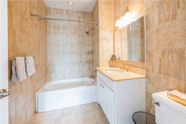 1 Christie Pl Unit 205E, Scarsdale, NY 10583 - full bath featuring tile walls, shower / washtub combination, vanity, and tile patterned flooring