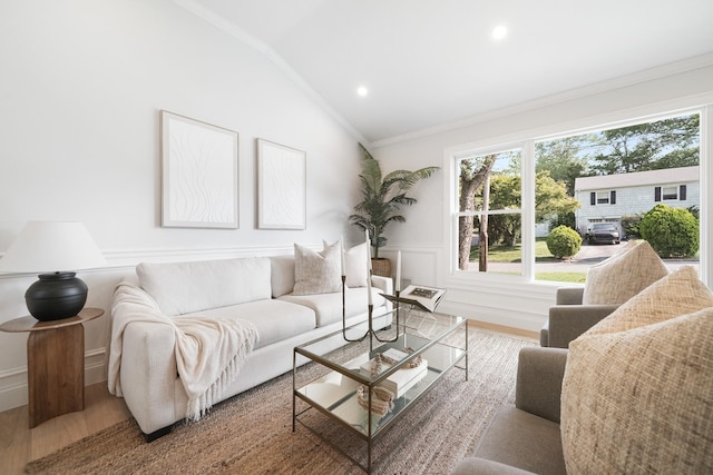 2 Danby Pl, Yonkers, NY 10710 - living room featuring wood finished floors, crown molding, vaulted ceiling, recessed lighting, and a decorative wall