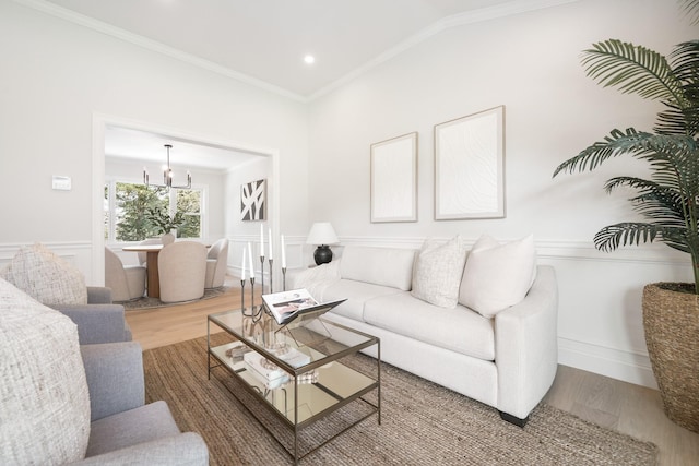 2 Danby Pl, Yonkers, NY 10710 - living area with wood finished floors, ornamental molding, a chandelier, and wainscoting