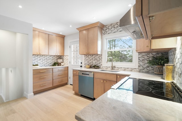2 Danby Pl, Yonkers, NY 10710 - kitchen with stainless steel dishwasher, ventilation hood, light countertops, tasteful backsplash, and recessed lighting