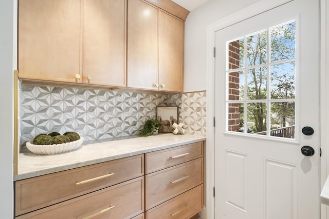 2 Danby Pl, Yonkers, NY 10710 - kitchen with light brown cabinetry, backsplash, and light stone counters