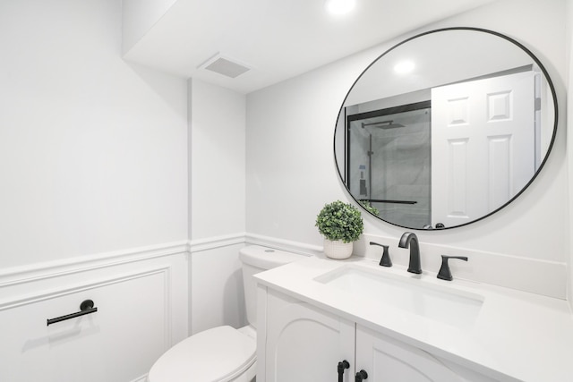 2 Danby Pl, Yonkers, NY 10710 - bathroom featuring vanity, an enclosed shower, a wainscoted wall, a decorative wall, and recessed lighting