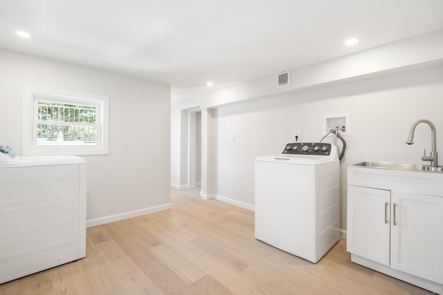 2 Danby Pl, Yonkers, NY 10710 - laundry area with independent washer and dryer, light wood finished floors, and recessed lighting