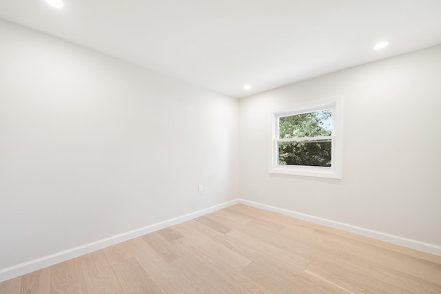 2 Danby Pl, Yonkers, NY 10710 - unfurnished room with light wood finished floors and recessed lighting