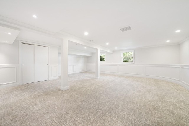 2 Danby Pl, Yonkers, NY 10710 - below grade area featuring a decorative wall, light carpet, recessed lighting, and crown molding