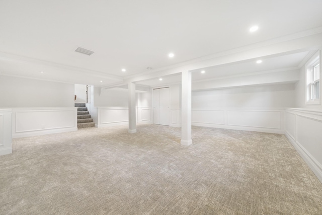 2 Danby Pl, Yonkers, NY 10710 - below grade area with a decorative wall, carpet, stairway, ornamental molding, and recessed lighting