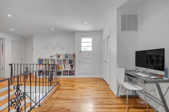 94 Fairview Ave, Great Neck, NY 11023 - home office with wood finished floors and recessed lighting