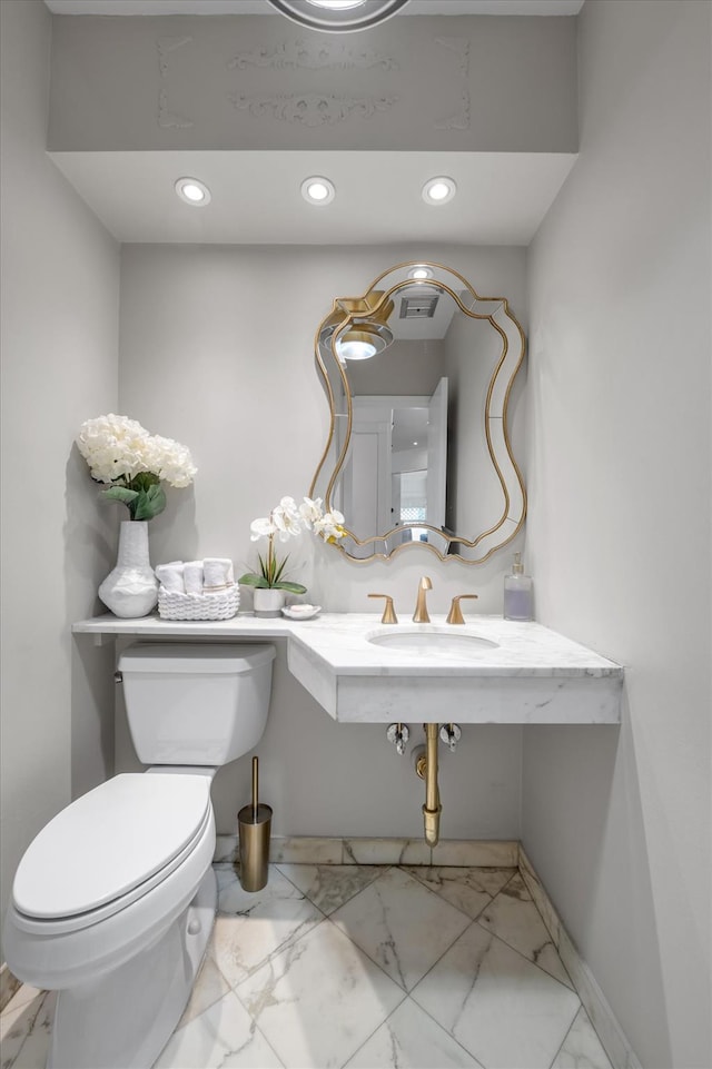 94 Fairview Ave, Great Neck, NY 11023 - bathroom featuring marble finish flooring and recessed lighting
