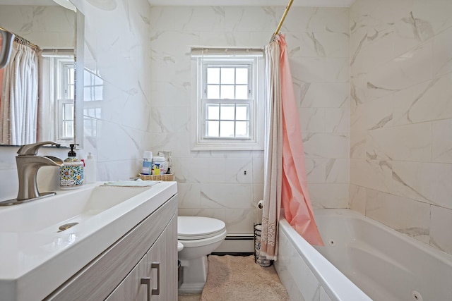 694 Koelbel Ct, Baldwin, NY 11510 - full bath featuring vanity, a combined bath / shower with jetted tub, baseboard heating, and tile walls