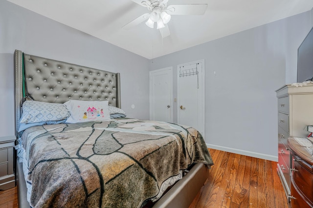 694 Koelbel Ct, Baldwin, NY 11510 - bedroom with wood finished floors and a ceiling fan