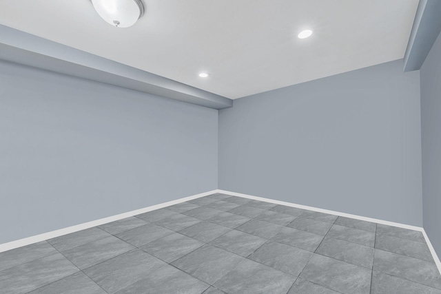 694 Koelbel Ct, Baldwin, NY 11510 - empty room with recessed lighting and baseboards