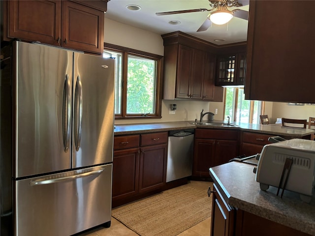 266 Adirondack Dr, Selden, NY 11784 - kitchen featuring stainless steel appliances, dark countertops, plenty of natural light, and ceiling fan