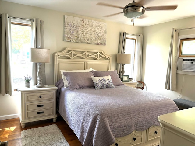 266 Adirondack Dr, Selden, NY 11784 - bedroom featuring multiple windows, dark wood finished floors, and ceiling fan