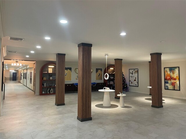 360 Central Ave Unit 217, Lawrence, NY 11559 - workout area featuring crown molding, ornate columns, and recessed lighting