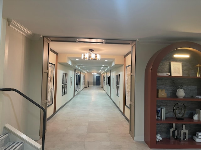 360 Central Ave Unit 217, Lawrence, NY 11559 - hallway with crown molding and arched walkways