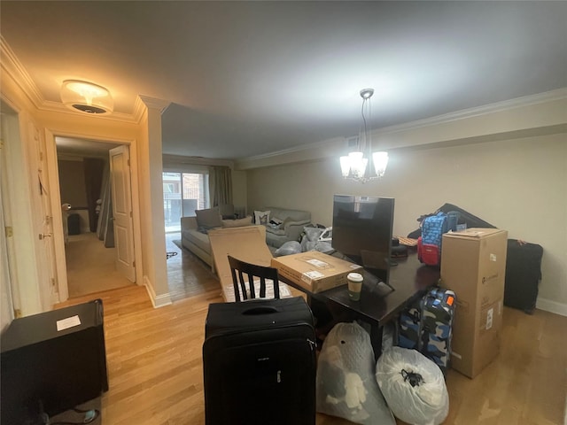 360 Central Ave Unit 217, Lawrence, NY 11559 - dining room with crown molding and light wood-style flooring