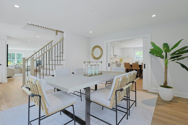 1 Devoe Rd, Armonk, NY 10504 - dining area featuring light wood-type flooring, plenty of natural light, stairway, and recessed lighting