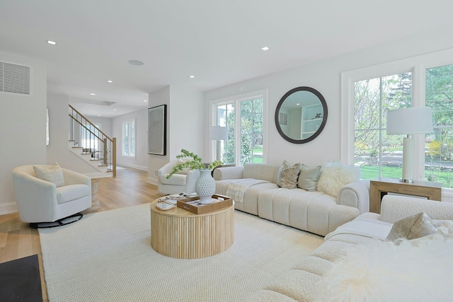 1 Devoe Rd, Armonk, NY 10504 - living room with light wood-style floors, healthy amount of natural light, stairway, and recessed lighting