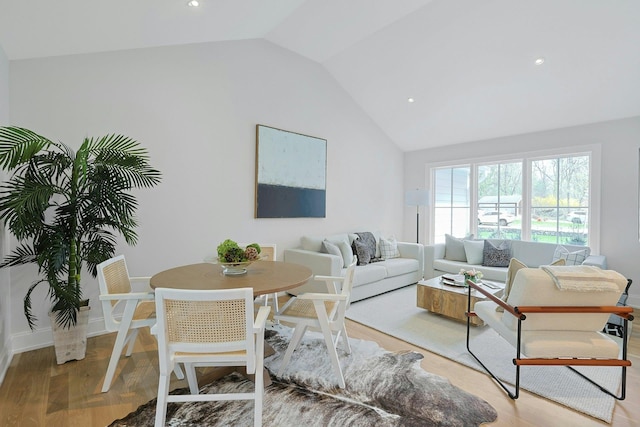 1 Devoe Rd, Armonk, NY 10504 - living room with light wood finished floors, vaulted ceiling, and recessed lighting