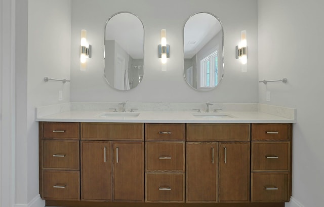 1 Devoe Rd, Armonk, NY 10504 - bathroom featuring double vanity and baseboards