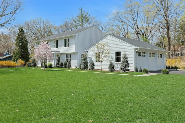 1 Devoe Rd, Armonk, NY 10504 - colonial-style house with an attached garage, a front lawn, and asphalt driveway