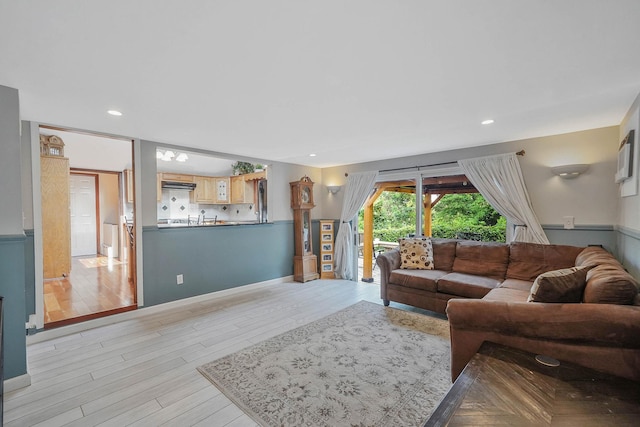 6 Sunrise Pl, Farmingville, NY 11738 - living area with light wood-style flooring and recessed lighting