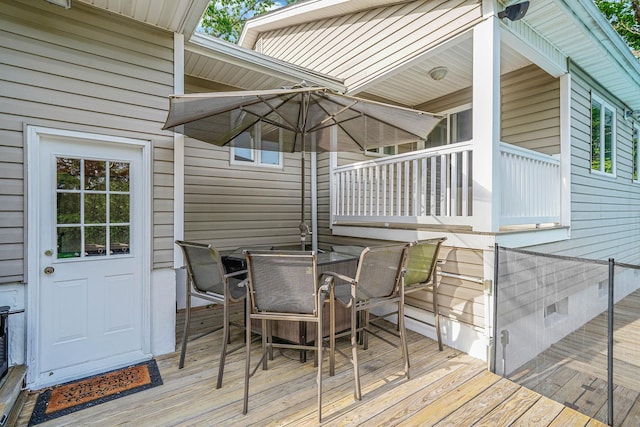 6 Sunrise Pl, Farmingville, NY 11738 - wooden deck with outdoor dining area