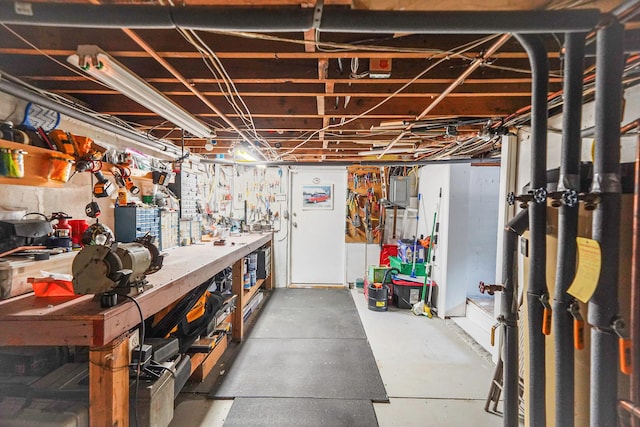 6 Sunrise Pl, Farmingville, NY 11738 - unfinished basement featuring a workshop area and electric panel