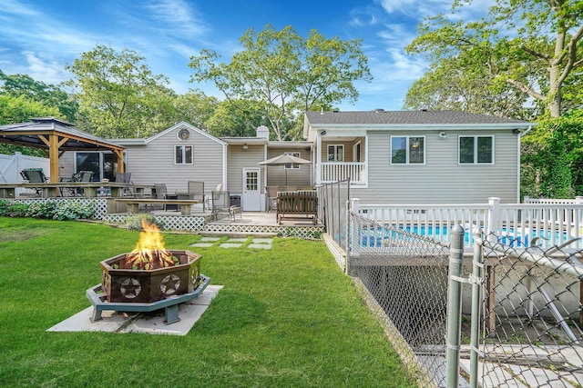 6 Sunrise Pl, Farmingville, NY 11738 - back of house featuring a fire pit, a deck, and a gazebo