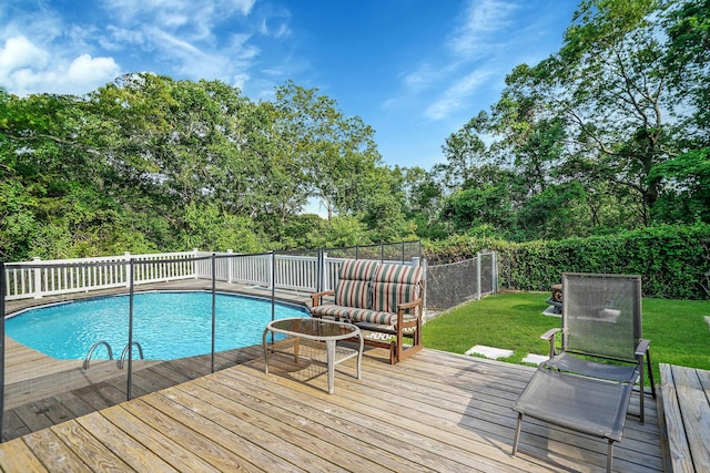6 Sunrise Pl, Farmingville, NY 11738 - view of pool featuring a fenced backyard, a deck, and view of scattered trees