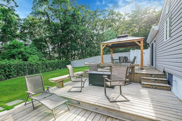 6 Sunrise Pl, Farmingville, NY 11738 - wooden terrace featuring a gazebo, a fenced backyard, and view of scattered trees