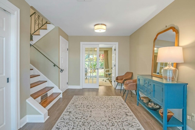 92 Wiltshire Rd, Scarsdale, NY 10583 - entrance foyer featuring stairway and wood finished floors