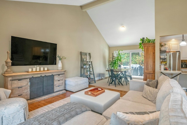 92 Wiltshire Rd, Scarsdale, NY 10583 - living area with high vaulted ceiling, wood finished floors, and beam ceiling