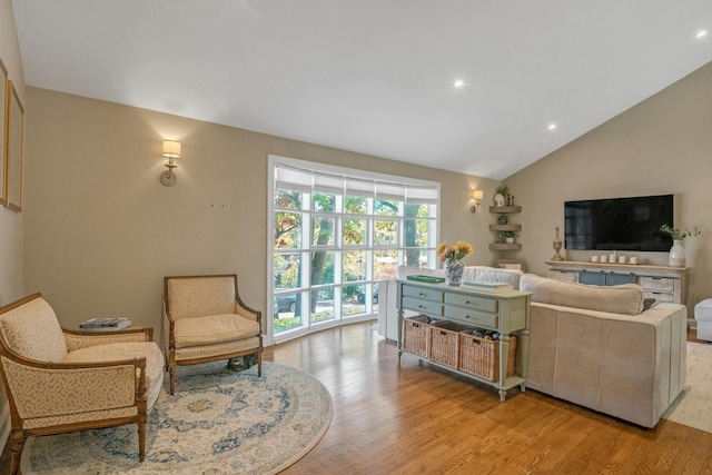 92 Wiltshire Rd, Scarsdale, NY 10583 - living area with vaulted ceiling, light wood-type flooring, and recessed lighting