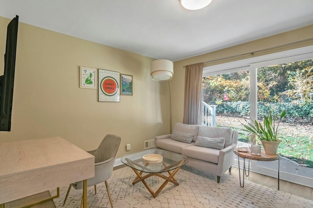 92 Wiltshire Rd, Scarsdale, NY 10583 - living area featuring light wood-style floors and baseboards