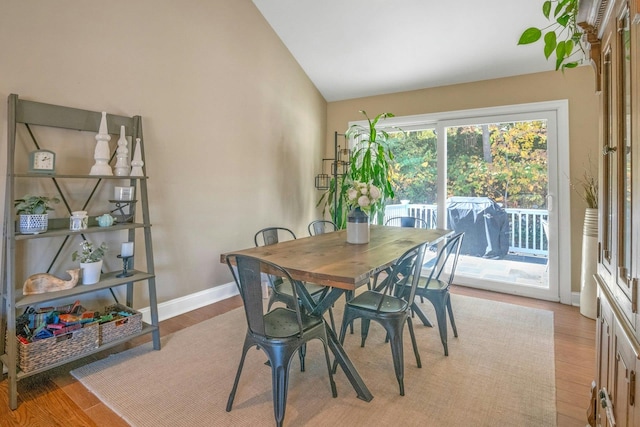 92 Wiltshire Rd, Scarsdale, NY 10583 - dining room with light wood-type flooring and lofted ceiling