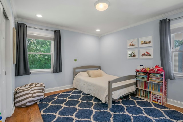 92 Wiltshire Rd, Scarsdale, NY 10583 - bedroom featuring wood finished floors, crown molding, and recessed lighting