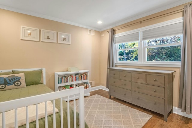 92 Wiltshire Rd, Scarsdale, NY 10583 - bedroom featuring crown molding, wood finished floors, and recessed lighting