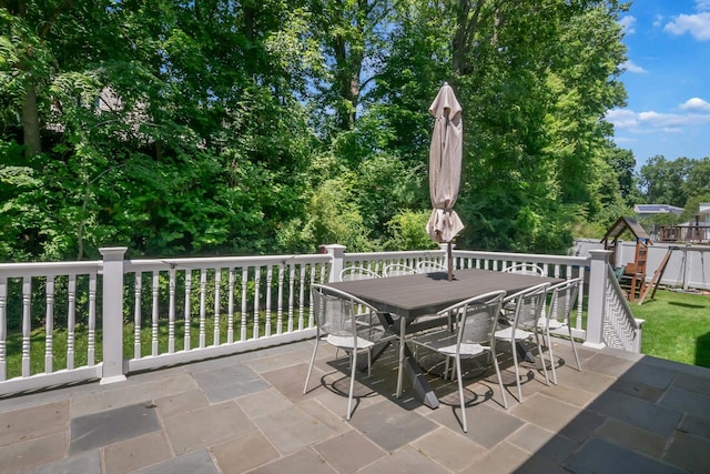 92 Wiltshire Rd, Scarsdale, NY 10583 - view of patio / terrace with a playground and outdoor dining space