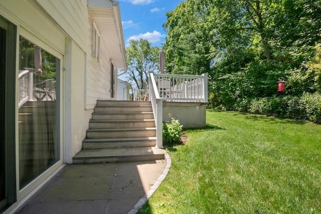 92 Wiltshire Rd, Scarsdale, NY 10583 - view of green lawn featuring a wooden deck and stairs