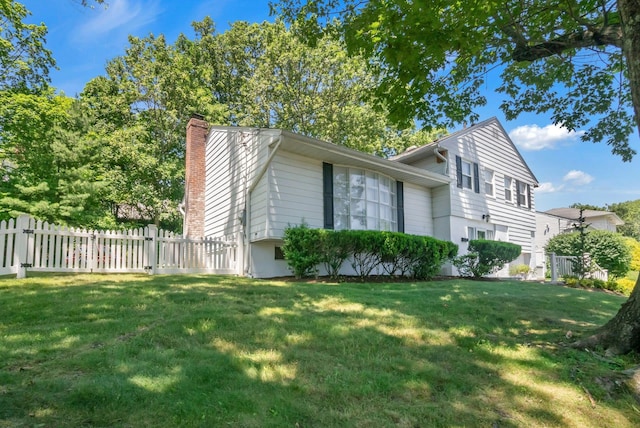 92 Wiltshire Rd, Scarsdale, NY 10583 - view of home's exterior with a chimney