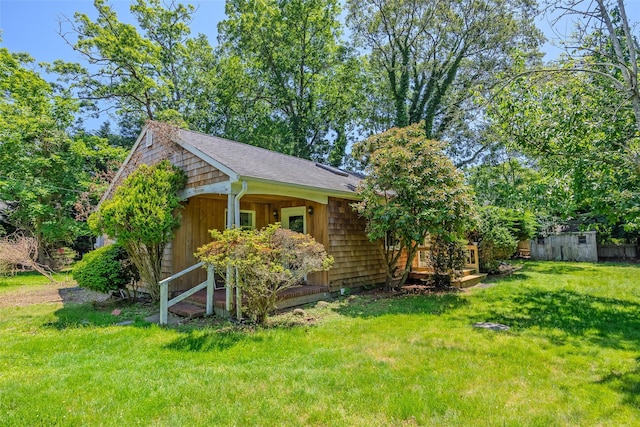 82A Union Ave, Center Moriches, NY 11934 - view of front of property with a front yard and a storage shed