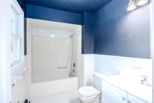 82A Union Ave, Center Moriches, NY 11934 - bathroom featuring bathing tub / shower combination, vanity, tile patterned flooring, and tile walls