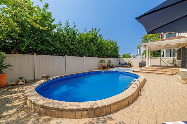 135 Flamingo St, Atlantic Beach, NY 11509 - view of pool with a patio area and a fenced backyard