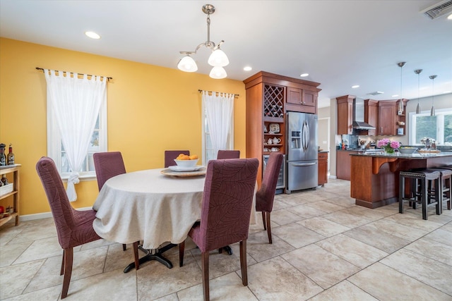 135 Flamingo St, Atlantic Beach, NY 11509 - dining space featuring recessed lighting and a chandelier