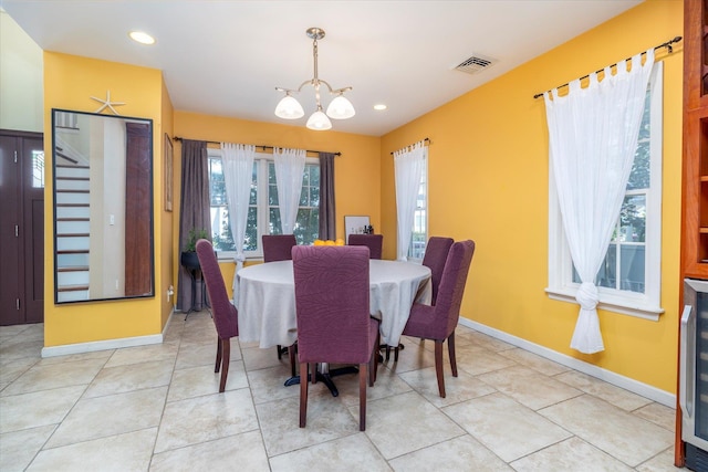 135 Flamingo St, Atlantic Beach, NY 11509 - dining area with a chandelier and recessed lighting