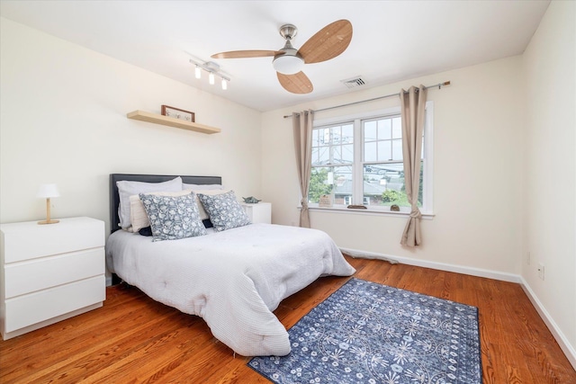 135 Flamingo St, Atlantic Beach, NY 11509 - bedroom with wood finished floors and ceiling fan
