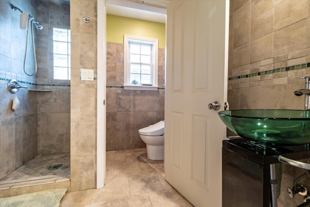 135 Flamingo St, Atlantic Beach, NY 11509 - full bathroom with a stall shower, tile walls, tile patterned floors, and vanity